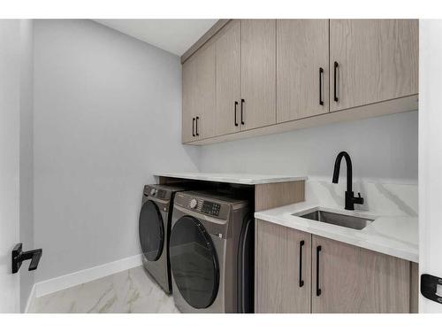 38 South Shore Road, Chestermere, AB - Indoor Photo Showing Laundry Room