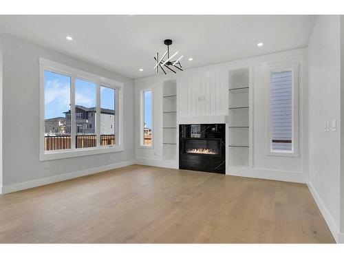 38 South Shore Road, Chestermere, AB - Indoor Photo Showing Living Room With Fireplace