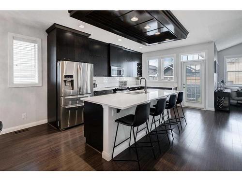 1391 Ravenscroft Way Se, Airdrie, AB - Indoor Photo Showing Kitchen With Upgraded Kitchen