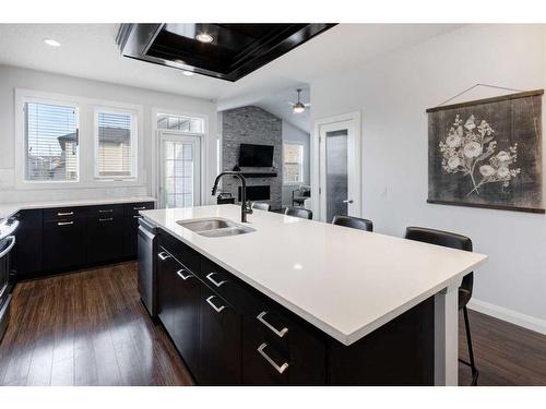 1391 Ravenscroft Way Se, Airdrie, AB - Indoor Photo Showing Kitchen With Double Sink