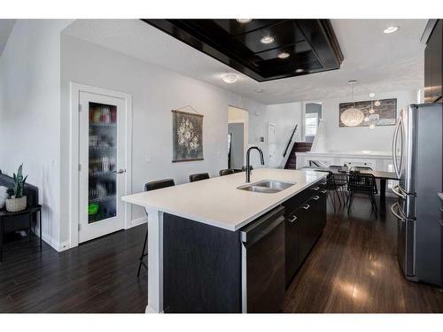 1391 Ravenscroft Way Se, Airdrie, AB - Indoor Photo Showing Kitchen With Double Sink