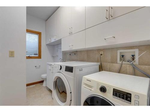 120 6 Avenue Nw, Calgary, AB - Indoor Photo Showing Laundry Room