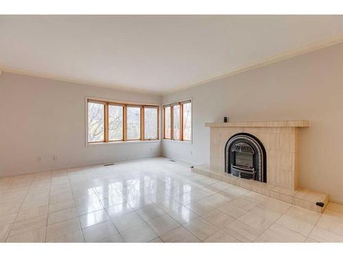 120 6 Avenue Nw, Calgary, AB - Indoor With Fireplace