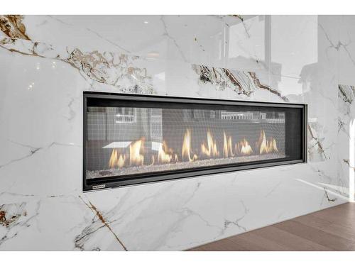 42 South Shore Bay, Chestermere, AB - Indoor With Fireplace