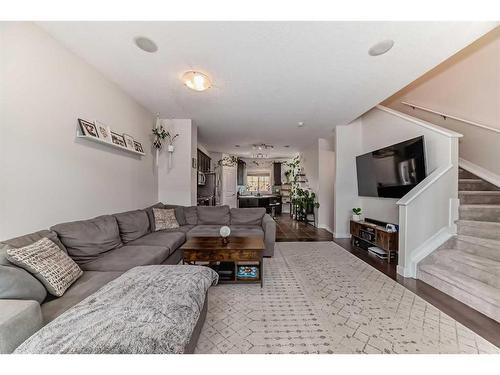 213 Rainbow Falls Drive, Chestermere, AB - Indoor Photo Showing Living Room