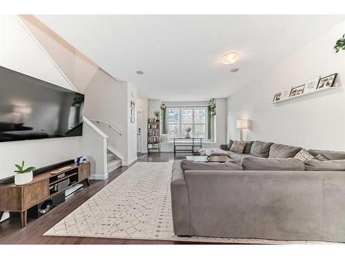 213 Rainbow Falls Drive, Chestermere, AB - Indoor Photo Showing Living Room