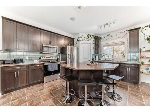 213 Rainbow Falls Drive, Chestermere, AB - Indoor Photo Showing Kitchen With Stainless Steel Kitchen With Upgraded Kitchen