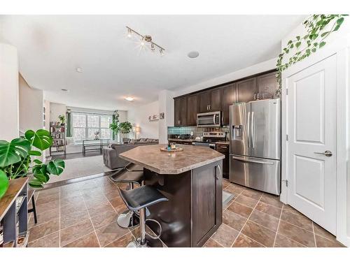 213 Rainbow Falls Drive, Chestermere, AB - Indoor Photo Showing Kitchen With Stainless Steel Kitchen