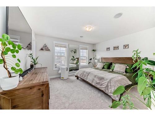 213 Rainbow Falls Drive, Chestermere, AB - Indoor Photo Showing Bedroom