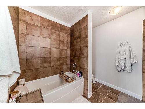 213 Rainbow Falls Drive, Chestermere, AB - Indoor Photo Showing Bathroom