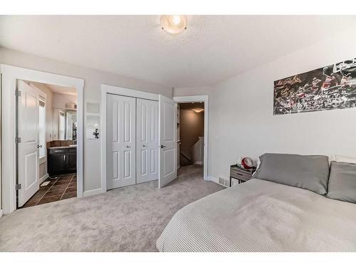 213 Rainbow Falls Drive, Chestermere, AB - Indoor Photo Showing Bedroom