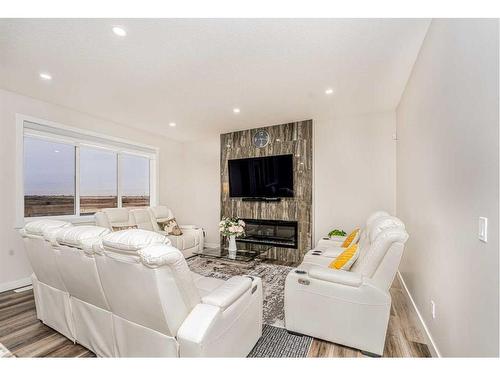 112 Belvedere Drive Se, Calgary, AB - Indoor Photo Showing Living Room With Fireplace