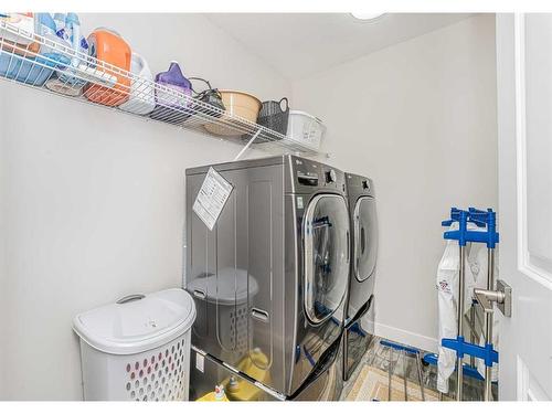 112 Belvedere Drive Se, Calgary, AB - Indoor Photo Showing Laundry Room