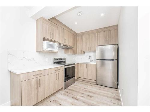 112 Belvedere Drive Se, Calgary, AB - Indoor Photo Showing Kitchen With Stainless Steel Kitchen