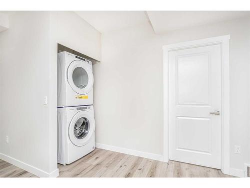 112 Belvedere Drive Se, Calgary, AB - Indoor Photo Showing Laundry Room