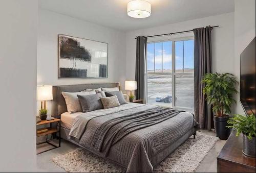 394 Alpine Avenue Sw, Calgary, AB - Indoor Photo Showing Bedroom