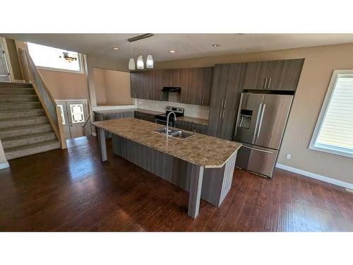 7011 49A Avenue, Camrose, AB - Indoor Photo Showing Kitchen With Double Sink