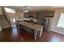 7011 49A Avenue, Camrose, AB  - Indoor Photo Showing Kitchen With Double Sink 