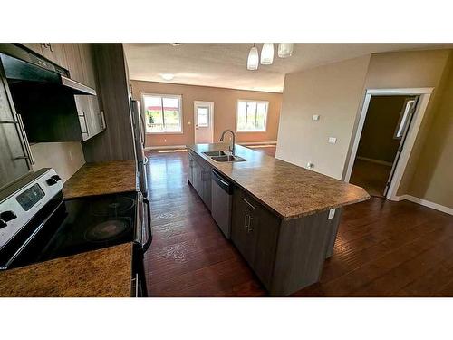 7011 49A Avenue, Camrose, AB - Indoor Photo Showing Kitchen With Double Sink