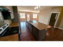 7011 49A Avenue, Camrose, AB  - Indoor Photo Showing Kitchen With Double Sink 