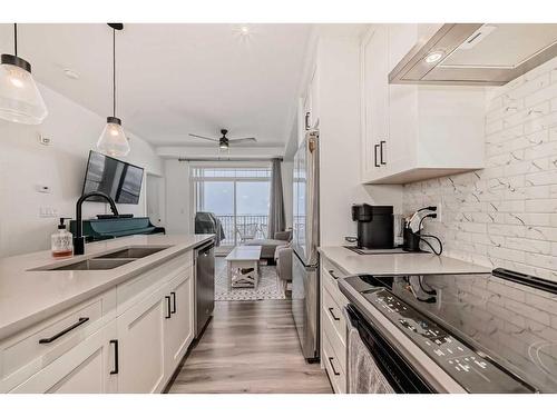 412-400 Auburn Meadows Common Se, Calgary, AB - Indoor Photo Showing Kitchen With Double Sink