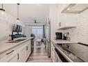 412-400 Auburn Meadows Common Se, Calgary, AB  - Indoor Photo Showing Kitchen With Double Sink 