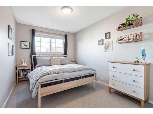 225 Mt Douglas Close Se, Calgary, AB - Indoor Photo Showing Bedroom