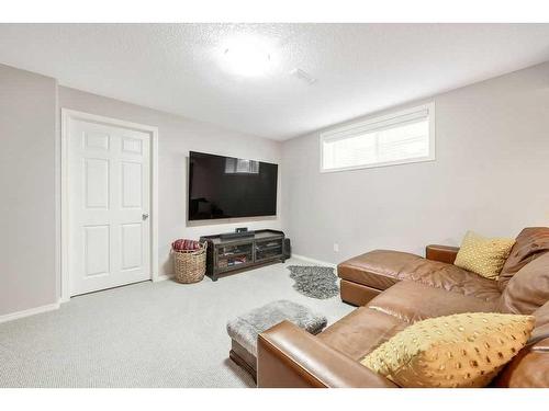 225 Mt Douglas Close Se, Calgary, AB - Indoor Photo Showing Living Room