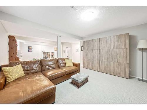 225 Mt Douglas Close Se, Calgary, AB - Indoor Photo Showing Living Room