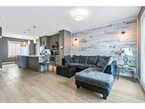 46-111 Rainbow Falls Gate, Chestermere, AB - Indoor Photo Showing Living Room