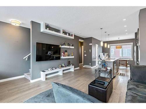 46-111 Rainbow Falls Gate, Chestermere, AB - Indoor Photo Showing Living Room