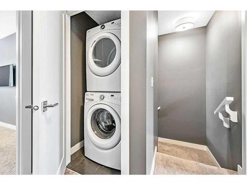 46-111 Rainbow Falls Gate, Chestermere, AB - Indoor Photo Showing Laundry Room