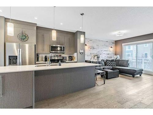 46-111 Rainbow Falls Gate, Chestermere, AB - Indoor Photo Showing Kitchen With Upgraded Kitchen