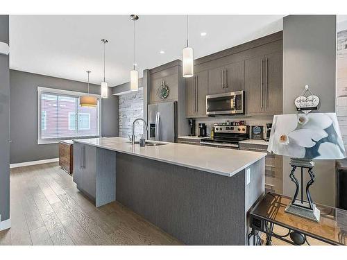 46-111 Rainbow Falls Gate, Chestermere, AB - Indoor Photo Showing Kitchen With Upgraded Kitchen