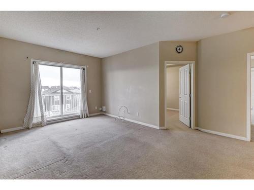 1310-1140 Taradale Drive Ne, Calgary, AB - Indoor Photo Showing Other Room