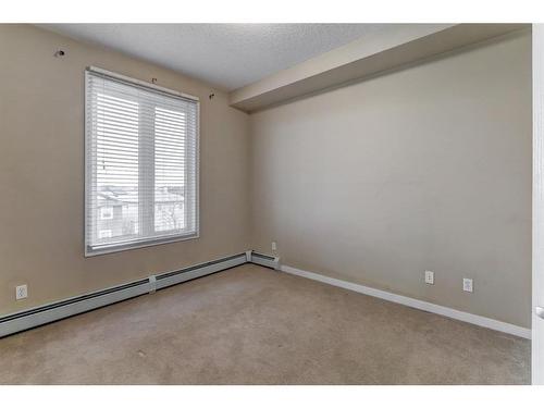 1310-1140 Taradale Drive Ne, Calgary, AB - Indoor Photo Showing Other Room