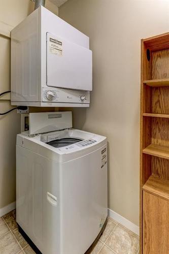 1310-1140 Taradale Drive Ne, Calgary, AB - Indoor Photo Showing Laundry Room