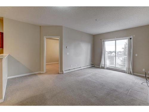 1310-1140 Taradale Drive Ne, Calgary, AB - Indoor Photo Showing Other Room