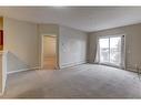 1310-1140 Taradale Drive Ne, Calgary, AB  - Indoor Photo Showing Other Room 