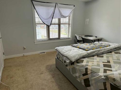 2120 21 Avenue, Didsbury, AB - Indoor Photo Showing Bedroom