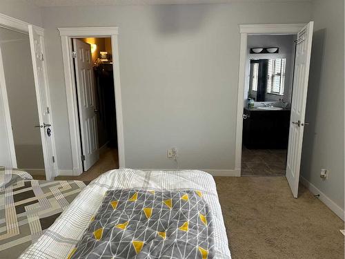 2120 21 Avenue, Didsbury, AB - Indoor Photo Showing Bedroom