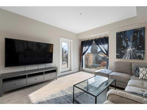 202-3375 15 Street Sw, Calgary, AB - Indoor Photo Showing Living Room