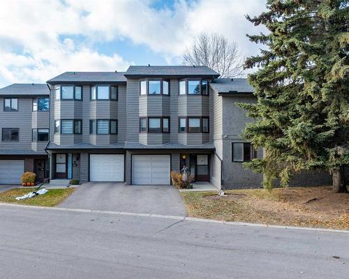 97-23 Glamis Drive Sw, Calgary, AB - Outdoor With Facade