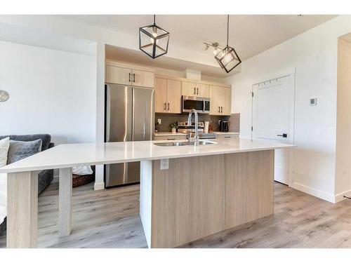 2308-200 Seton Circle Se, Calgary, AB - Indoor Photo Showing Kitchen With Double Sink