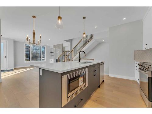 1-1927 27 Street Sw, Calgary, AB - Indoor Photo Showing Kitchen With Upgraded Kitchen