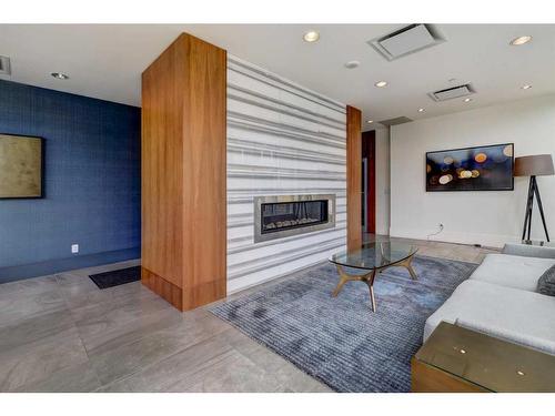 1407-128 2 Street Sw, Calgary, AB - Indoor Photo Showing Living Room With Fireplace