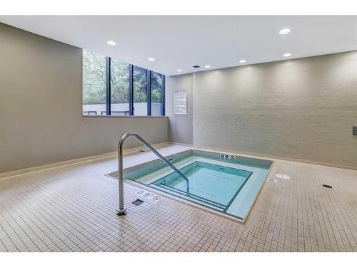 1407-128 2 Street Sw, Calgary, AB - Indoor Photo Showing Other Room With In Ground Pool