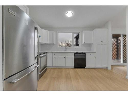 984 Rundlecairn Way Ne, Calgary, AB - Indoor Photo Showing Kitchen With Stainless Steel Kitchen