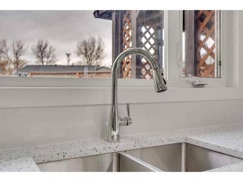 984 Rundlecairn Way Ne, Calgary, AB - Indoor Photo Showing Kitchen With Double Sink