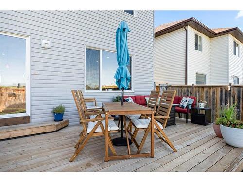 65 Crystal Shores Crescent, Okotoks, AB - Outdoor With Deck Patio Veranda With Exterior